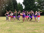Ladies outside at a private event dressed up for a burlesque dance class