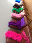 Feather boas and gloves lined up ready for the girls at the hen party